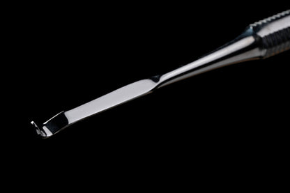 Double end spatula packer