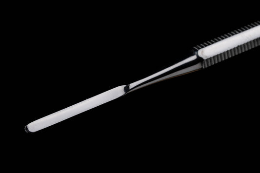 Double end spatula packer